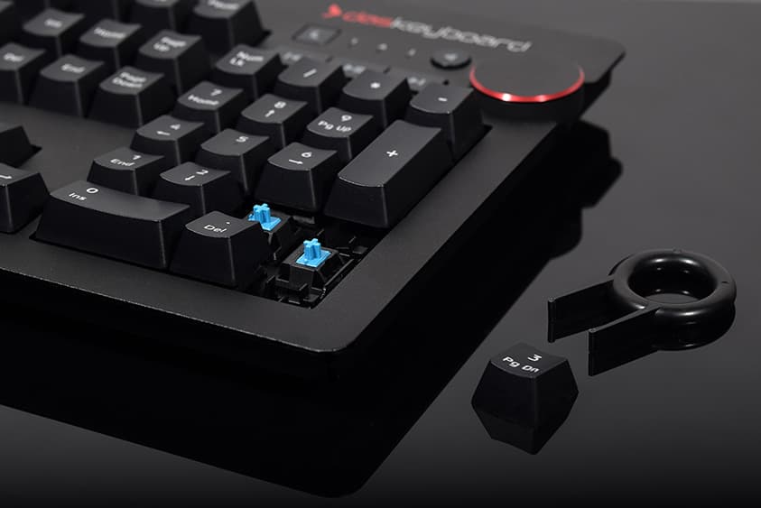 Close-up of a Das Keyboard with a keycap removed, showing the switch